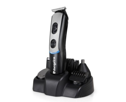 Orbegozo CTP 1840 Cortapelos Multifuncional - 7 en 1 para Cabello - Nariz y Barba - Recargable y con Opcion de Uso con Cable - Incluye Accesorios y Adaptador de Carga - Practico y Versatil