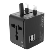 XO Adaptador de Viaje Universal - Voltaje 110V-240V - 2 Puertos USB 2.1Amp - Conexiones para UK, EU, AU, US - Color Negro