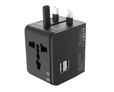 XO Adaptador de Viaje Universal - Voltaje 110V-240V - 2 Puertos USB 2.1Amp - Conexiones para UK, EU, AU, US - Color Negro